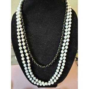 vintage Monet black/ gold tone and white /gold tone 3 necklace's